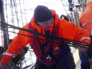 Roger on the foredeck during an offshore voyage on a schooner. Roger on the foredeck during an offshore voyage on a schooner.